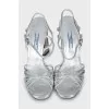 Silver sandals with heel decoration