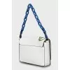 Leather crossbody bag with floral decor