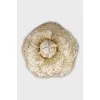 Textile brooch in gold color