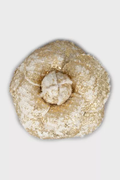Textile brooch in gold color