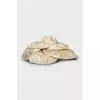 Textile brooch in gold color
