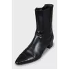 Black ankle boots with textile inserts