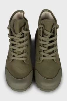 Green boots with brand logo