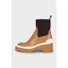 Leather boots with textile upper