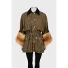 Parka decorated with fur on the sleeves