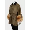Parka decorated with fur on the sleeves