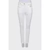 White mid rise skinny jeans