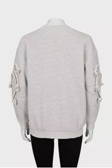 Gray sweatshirt with sleeve decoration