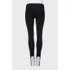 Black trousers with stripes and stirrups