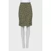 Pencil skirt with slits at the hem