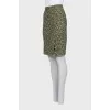 Pencil skirt with slits at the hem