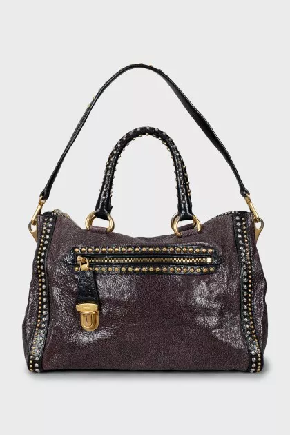 Leather tote bag with metal decor