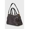 Leather tote bag with metal decor