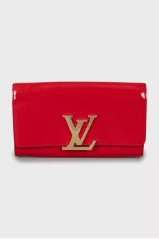 Patent leather clutch with gold logo