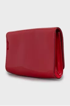 Patent leather clutch with gold logo