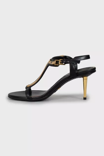 Leather sandals with golden heels
