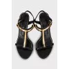 Leather sandals with golden heels