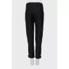 Tapered trousers with raised seams
