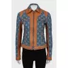 Denim jacket with leather inserts