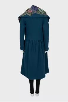 Wool coat with voluminous decor