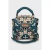 Mini bag with perforation and embroidery