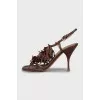 Leather sandals decorated with fringe