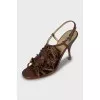 Leather sandals decorated with fringe
