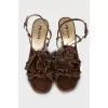Leather sandals decorated with fringe