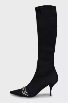 Suede over-the-knee boots decorated with eyelets