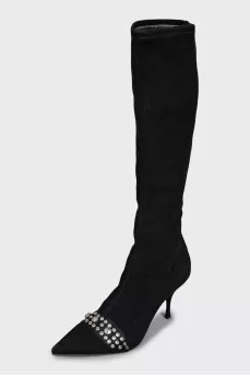 Suede over-the-knee boots decorated with eyelets
