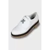 White shoes with twist buckle