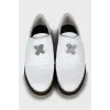 White shoes with twist buckle