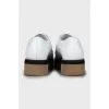 White shoes with twist buckle
