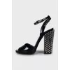 Leather sandals with heel decoration