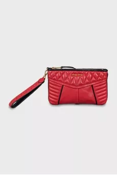 Quilted clutch with gold hardware