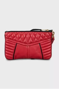 Quilted clutch with gold hardware