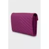 Quilted clutch with gold chain