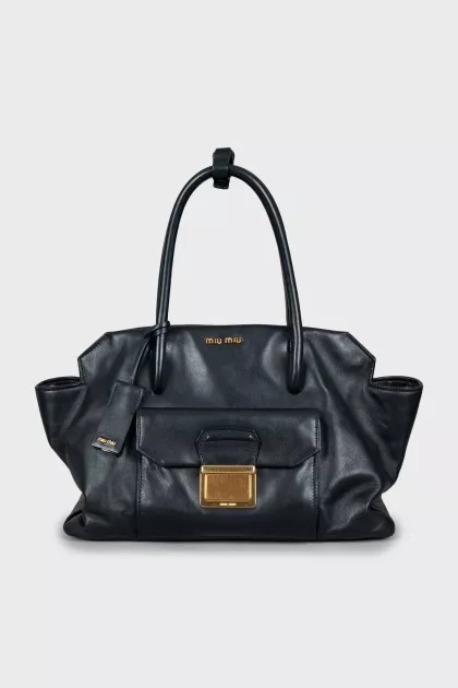 Black tote bag with gold hardware