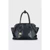 Black tote bag with gold hardware