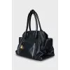 Black tote bag with gold hardware