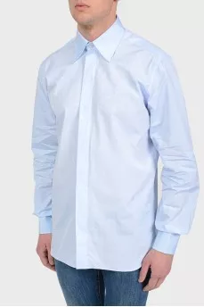 Blue shirt in print with a logo