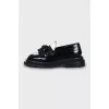 Black and white tassel loafers