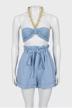 Suit with shorts decorated with chain