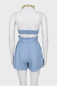 Suit with shorts decorated with chain