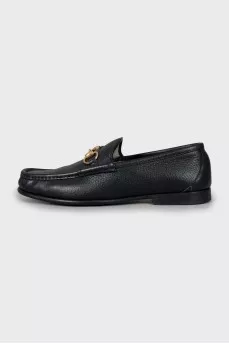 Leather loafers with gold decor
