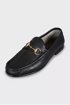 Leather loafers with gold decor