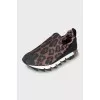 Textile sneakers in animal print