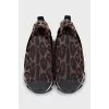 Textile sneakers in animal print