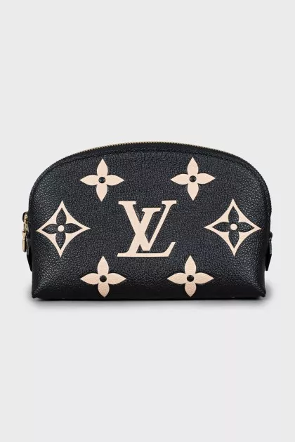 Leather cosmetic bag with embossing and tag