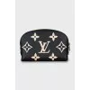 Leather cosmetic bag with embossing and tag